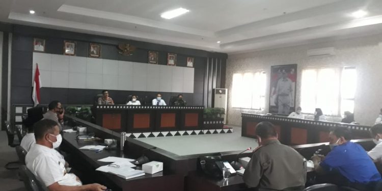 Fauzi Hasan Pimpin Rapat Evaluasi PPKM