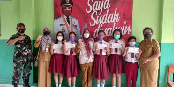 Koramil 410-03 TBU Bersama Puskesmas Sumur Batu Gelar Vaksinasi Bagu Anak Usia 6-11 Tahun