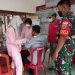 Babinsa Koramil 410-03/TBU dan Bhabinkamtibmas Pantau Kegiatan Vaksinasi di Wilayah Binaan