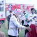 Bupati Winarti Kunjungi Mulyo Aji Kecamatan Meraksa aji, dan Berikan Bantuan