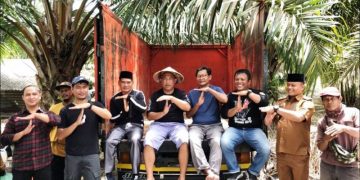 Umar Ahmad Panen Padi Nenemo Geco 01