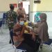 Anggota Koramil Purwantoro Dampingi Vaksinasi Kepada Warga