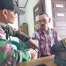Atasi Kesulitan Rakyat di Wilayah Perbatasan, Prajurit Satgas Pamtas Yonif 645/Gty menggelar aksi pengobatan Keliling Gratis