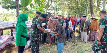Yonif Raider 300/Bjw Melaksanakan Panen Raya Padi Bersama Warga Desa Binaan