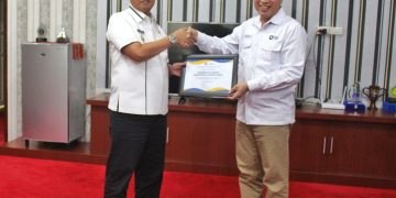 Drs Nukman MM Terima Penghargaan dari KPP Pratama Kota Bumi