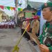 Peringati HUT RI ke 78, Babinsa Sertu Aris Susilo Pimpin Warga dan Nelayan Upacara Bendera