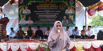 Hj. Devriyana Marda Ardian S. Kom. Menghadiri Perayaan Ulang Tahun Desa Tanjung Raja yang ke 105