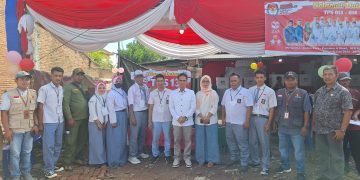 Ketua Bawaslu Lamsel Gunakan Hak Pilihnya di TPS 13 Desa Pajar Baru Kecamatan Jati Agung