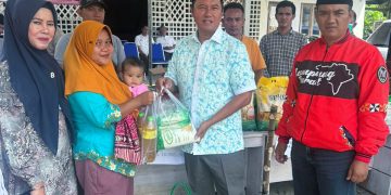 PJ Bupati Lampung Barat Salurkan Bahan Pangan Murah di Bandar Negeri Suoh