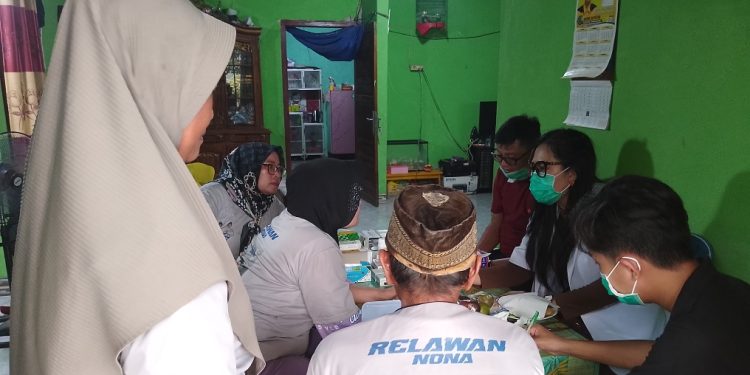 Masyarakat Penumangan Baru Geruduk Pengobatan Gratis