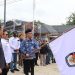 Bupati RAS, menghadiri Acara Pelepasan Distribusi Logistik Pemilihan Umum Serentak Tahun 2024 di Halaman Kantor KPU Way Kanan