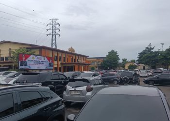 “Lautan Mobil” di Polda Lampung: Simbol Kekayaan atau Alarm Ketidakpercayaan?
