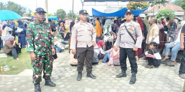Polsek Bumi Agung Lakukan Pengamanan BLTS Kesra di Kantor Pos 34782 Pisang Baru