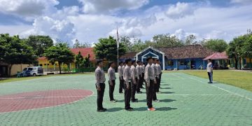 Guncang Lapangan SMKN 1 Menggala! Satlantas Polres Tulang Bawang Gembleng Pasukan PKS Menjadi “Garda Terdepan” Keselamatan Sekolah!
